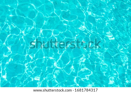 Abstract beautiful ripple wave and clear turquoise water surface in swimming pool, Turquoise or blue water wave for background and abstract