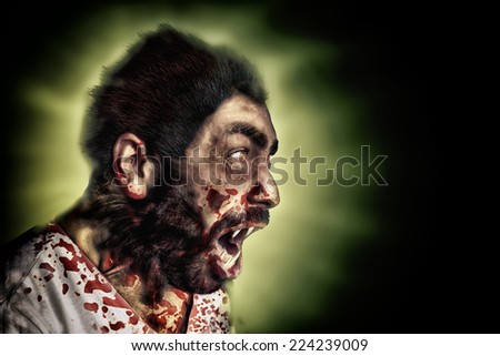 werewolf screaming and covered with blood