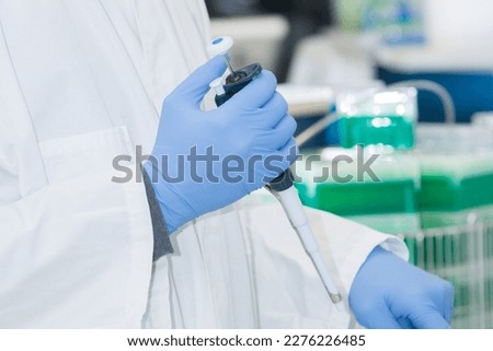 Similar – Image, Stock Photo man pipetting in the laboratory