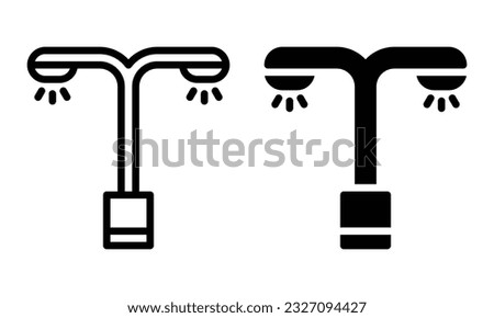 Street lamp icon with outline and glyph style.
