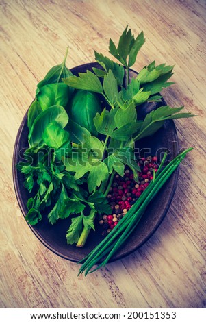 vintage photo of fresh herbs and colorful pepper