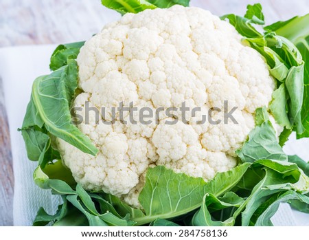 Fresh white cauliflower on a table. studio shot