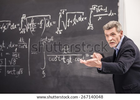 Professor of chemistry leading lecture in University.