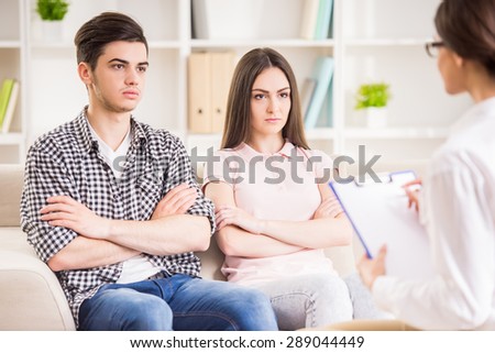 Young couple with relationship difficulties during therapy session.
