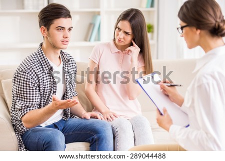 Young couple with relationship difficulties during therapy session.
