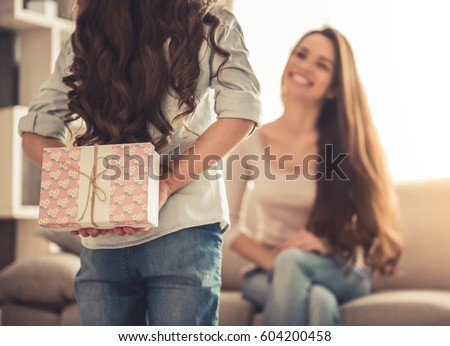 Similar – Image, Stock Photo Mother with cheerful child in the park.