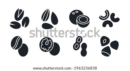 Nuts icon set. Black isolated silhouette. Fill solid icon. Modern design. Almond cashew coffee hazelnut peanut pistachios walnut coconut vector collection. Modern design. Healthy food and vitamins