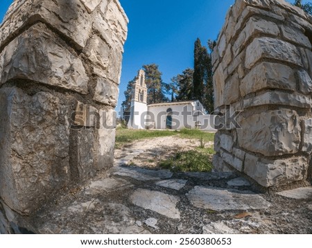 Similar – Image, Stock Photo Path through stone gate overgrown with ivy