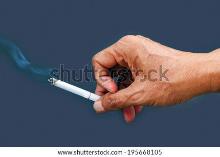 old man smoking on gray background