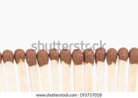 Brown head match sticks on white background.