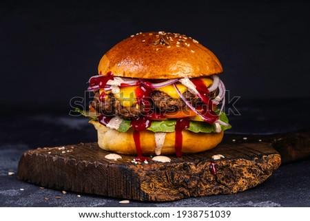 Similar – Image, Stock Photo Hamburger with ketchup and herbs