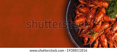A pile of tasty boiled crawfish. Boiled red crayfish or crawfish with  herbs. Crayfish party, restaurant, cafe, pub menu. ストックフォト © 
