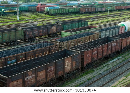 Bataysk, Russia - July 30, 2015:  Bataysk railway station. Big railway cargo and passengers\
 station junction with lot of trains and track lines.