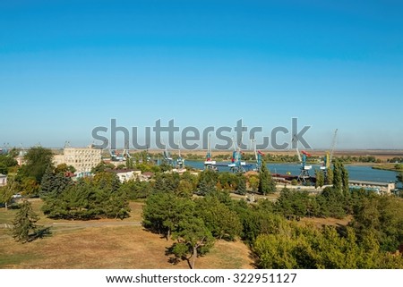 Azov, Rostov - on - Don region, Russia - September 27, 2015: Water area of the Don river and industrial port with crane, established in coastal street in Azov.