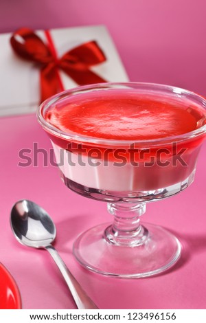 Red jelly in glass cup with pink pudding for Valentine-day