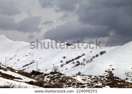 Off-piste slope and overcast sky. Caucasus Mountains, Georgia, ski resort Gudauri.