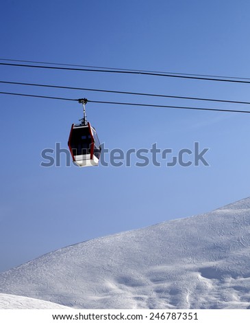 Gondola lift and off piste slope at sun morning. Caucasus Mountains, Georgia. Ski resort Gudauri.