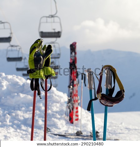 Protective sports equipments on ski poles at ski resort at sunny day