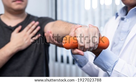 Similar – Image, Stock Photo rehabilitation therapy. Hands treating a young woman’s shoulder