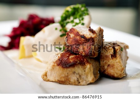 Grilled turkey with boiled potatoes and beet-cucumber salad