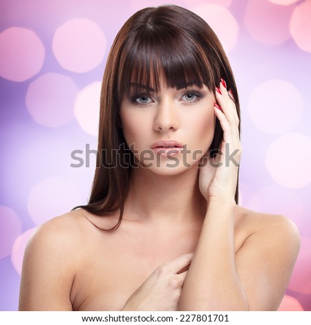 Portrait of beautiful female model on white background