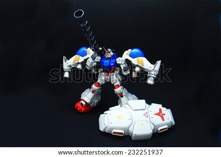 THAILAND - JUNE 20, 2012 : Figure of Gundam RX-78 GP02A animation is standing on black background on June 20, 2012, Suphanburi, Thailand.