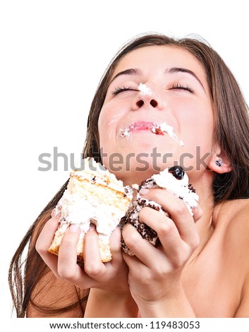 Teen girl eating the cake