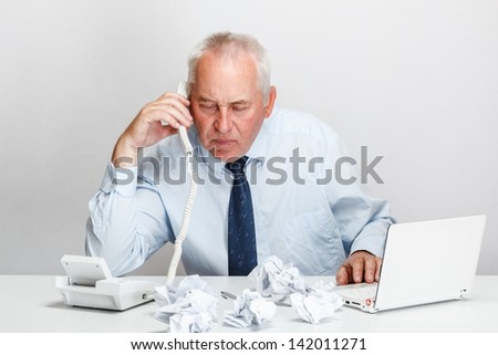 Executive businessman calling by phone