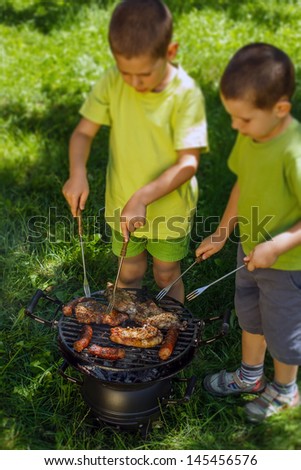 Brothers having a barbecue party