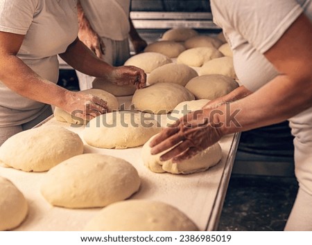 Similar – Foto Bild Bäcker formt Brot in der Küche