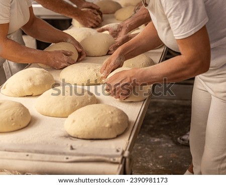 Similar – Foto Bild Bäcker formt Brot in der Küche