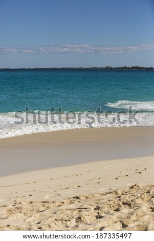 Sunny clear day at the beach in the Caribbean Sea, Nassau, Bahamas.
