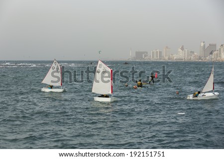 TEL AVIV, ISRAEL - MARCH 7: Kids learning to sail on the Mediterranean Sea in Tel Aviv, Israel, on March 7, 2014.