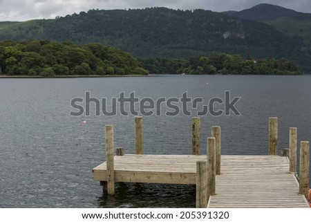 KESWICK, ENGLAND - JUNE 13: Lanscape near Lake Derwentwater in Keswick, England on June 13, 2013. Lake Derwentwater is part of the famous Lake District in England.