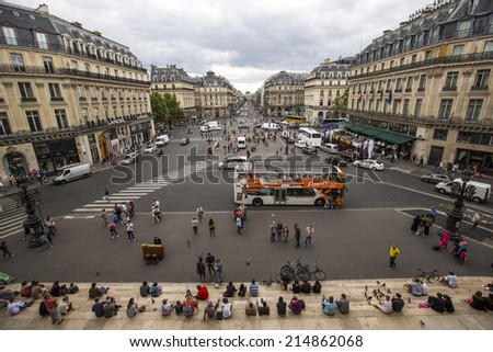 Paris, France - August 19: View of Opera Boulevard from the Garnier Palace in Paris, France on August 19, 2014. The Louvre Museum can be seen from the Garnier Palace.