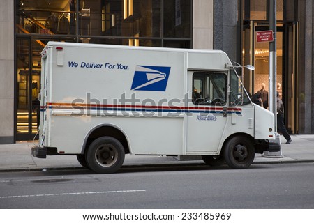 New York City - November 3: USPS truck delivers packages on November 3, 2014 in New York City. USPS is one of largest package delivery companies in USA.