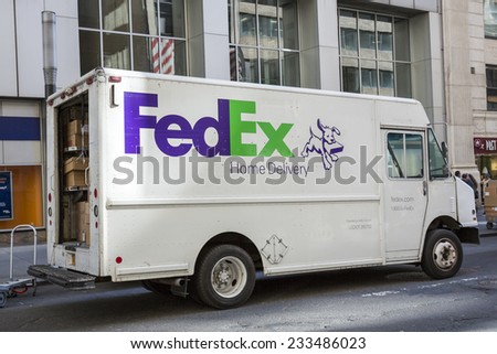 New York City, November 3: FedEx truck delivers packages on November 3, 2014 in New York City. FedEx is one of largest package delivery companies worldwide.