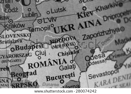 Map view of Ukraine on a geographical globe. (black and white)