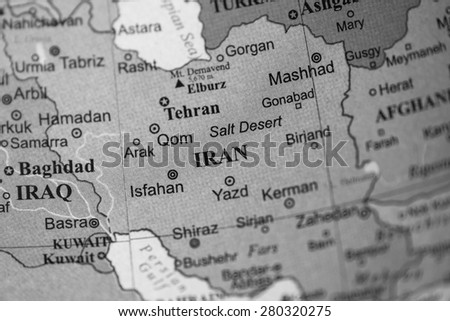 Map view of Iran on a geographical globe. (black and white)
