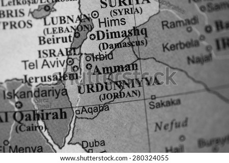 Map view of Jordan on a geographical globe. (black and white)