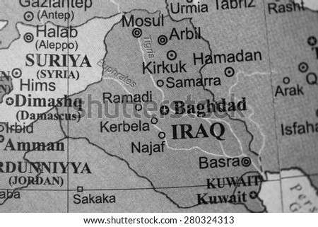 Map view of Iraq on a geographical globe. (black and white)