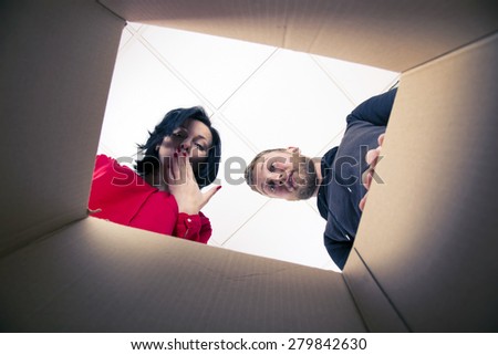 Couple looking inside the box