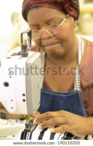 Employee working on a industrial sewing machine