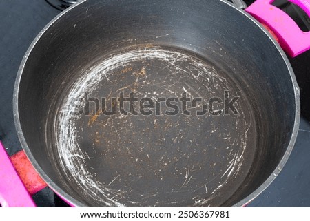 Similar – Image, Stock Photo Old used pan on rustic wood