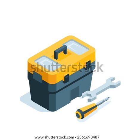 isometric portable tool box next to wrench and screwdriver, in color on white background, work tool