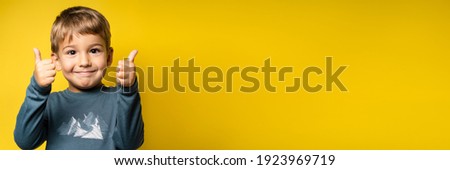 Similar – Image, Stock Photo Cute little boy celebrating of July, 4 Independence Day of USA at sunny summer sunset. Happy child running and jumping with american flag symbol of United States over wheat field.