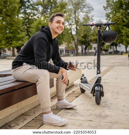 Similar – Image, Stock Photo Young man with electric bicycle in the autumn park