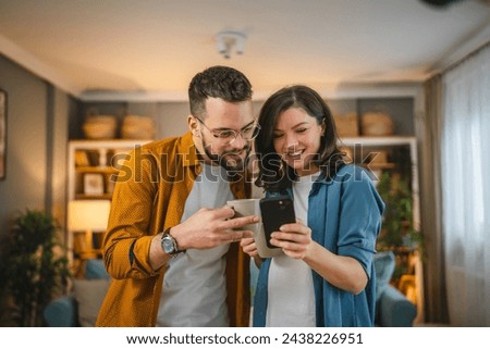 Similar – Image, Stock Photo Happy couple having video conversation on laptop at home