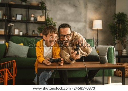 Similar – Image, Stock Photo Father and child having fun in park