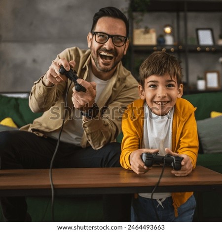 Similar – Image, Stock Photo Father and child having fun in park